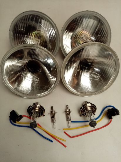 Picture of HALOGEN HEADLAMP SET 5 3/4 WITH HALOGEN LOGO INC BULBS/2 X H4 PLUGS RIGHT HAND DRIVE STAG/VIT/2000/SPRINT/1850/1500HL((JPS579)